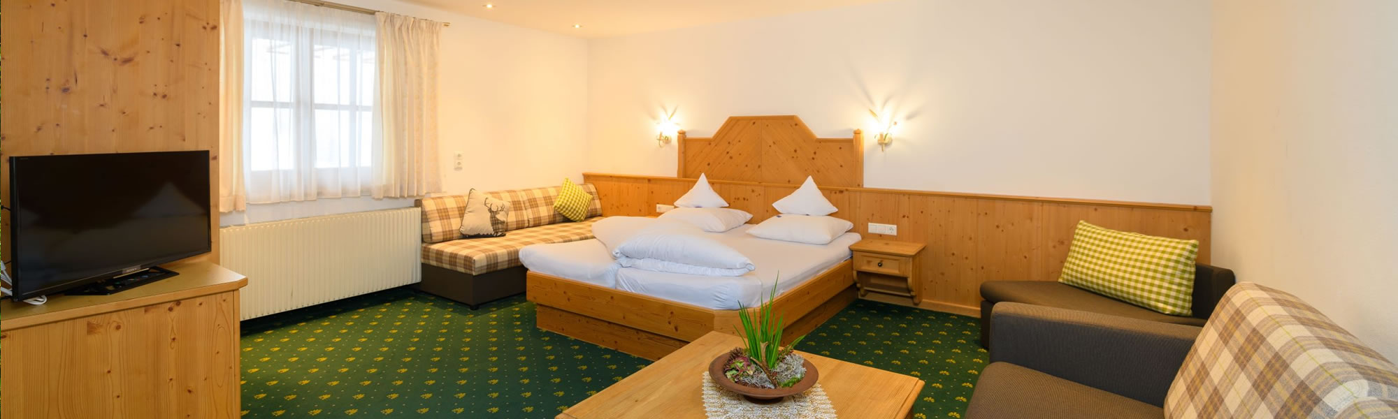 Dreibettzimmer Alpensuite in Hotel Dorfer, Großarl