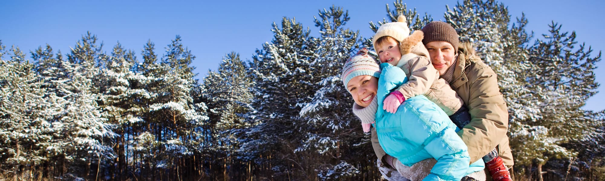 Familie mit Kind im Winterurlaub in Großarl